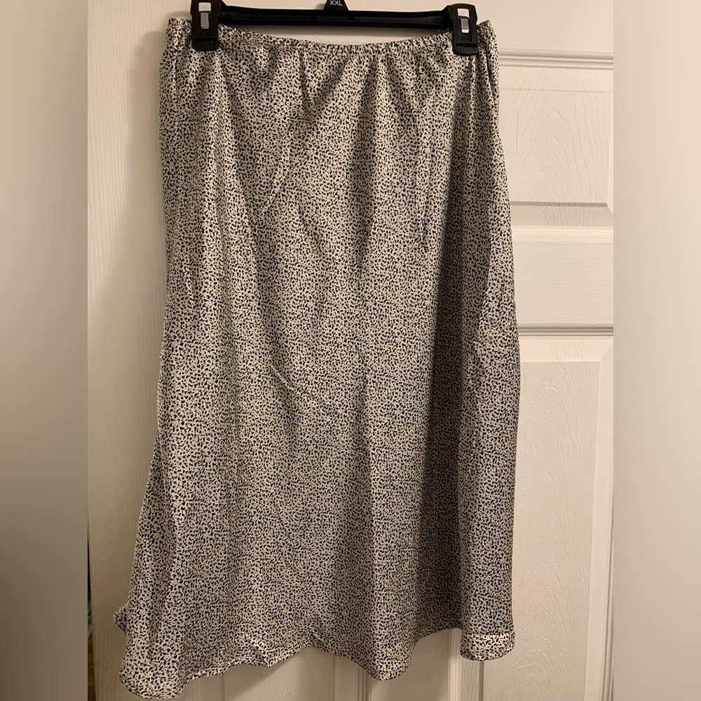 Gently worn black and white silk skirt.